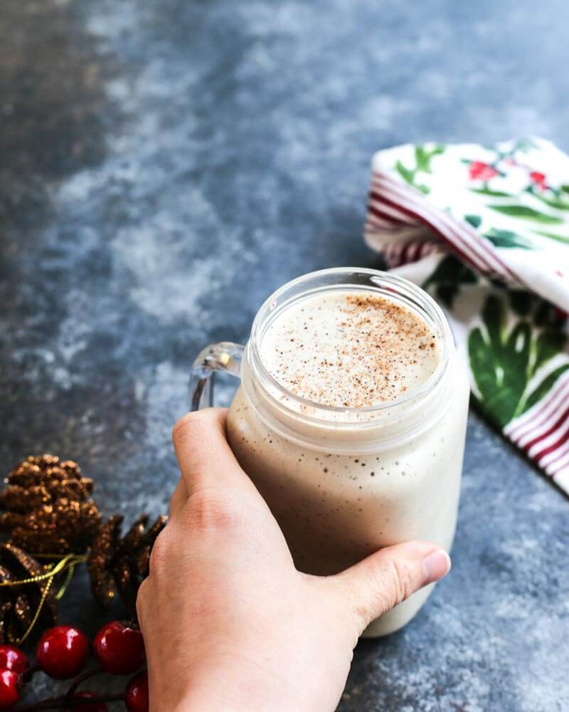 Bring the coffee shop to your house with this eggnog frappuccino that's easy to make at home-- all you need is eggnog, banana, coffee, (protein powder-- if you wish) and a blender! 