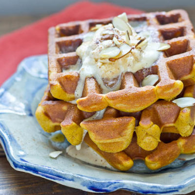 These Pumpkin Blender Waffles with Pumpkin Cream boast of fall flavors and are made in the BLENDER!! They are decadent, fluffy, and pumpkiny. Don’t make them without the Pumpkin Spice Cream… it’s melt in your mouth yum yum.