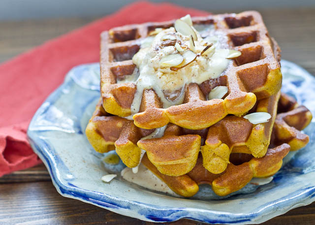These Pumpkin Blender Waffles with Pumpkin Cream boast of fall flavors and are made in the BLENDER!! They are decadent, fluffy, and pumpkiny. Don’t make them without the Pumpkin Spice Cream… it’s melt in your mouth yum yum.