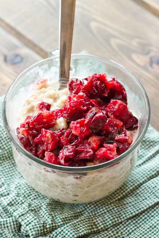 Roasted Cranberries will change your life. They are all cinnamonny and mapley and topped on a comforting bowl of quinoa oatmeal! Just know, a bowl of Roasted Cranberries & Quinoa Oatmeal will be sure to give you that holiday fever. 