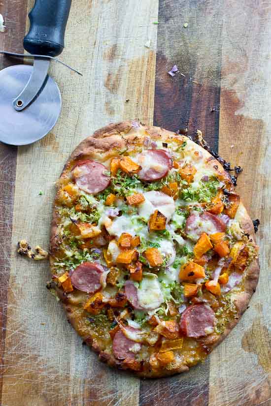 This sweet and savory pizza is loaded with the goodness of the fall season. Brussels sprouts and butternut squash make this naan pizza hearty and healthy!