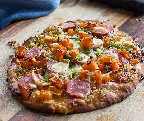 This sweet and savory pizza is loaded with the goodness of the fall season. Brussels sprouts and butternut squash make this naan pizza hearty and healthy!