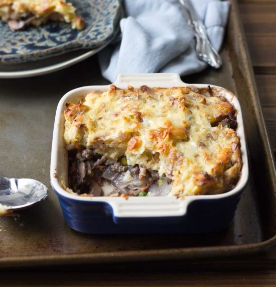 This Healthy Shepard's Pie for Two is the ultimate comfort meal. It's meaty and veggie-fied topped with insanely creamy mashed potatoes. You're welcome. 