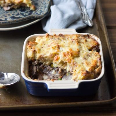 This Healthy Shepard's Pie for Two is the ultimate comfort meal. It's meaty and veggie-fied topped with insanely creamy mashed potatoes. You're welcome.