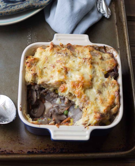 This Healthy Shepard's Pie for Two is the ultimate comfort meal. It's meaty and veggie-fied topped with insanely creamy mashed potatoes. You're welcome. 