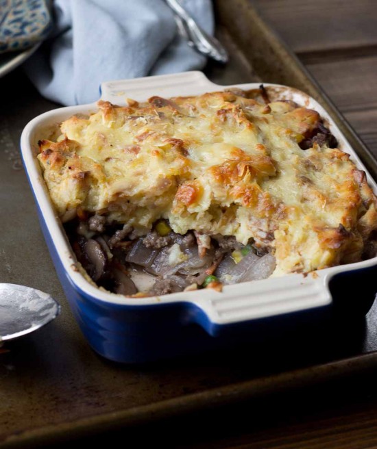 This Healthy Shepard's Pie for Two is the ultimate comfort meal. It's meaty and veggie-fied topped with insanely creamy mashed potatoes. You're welcome. 