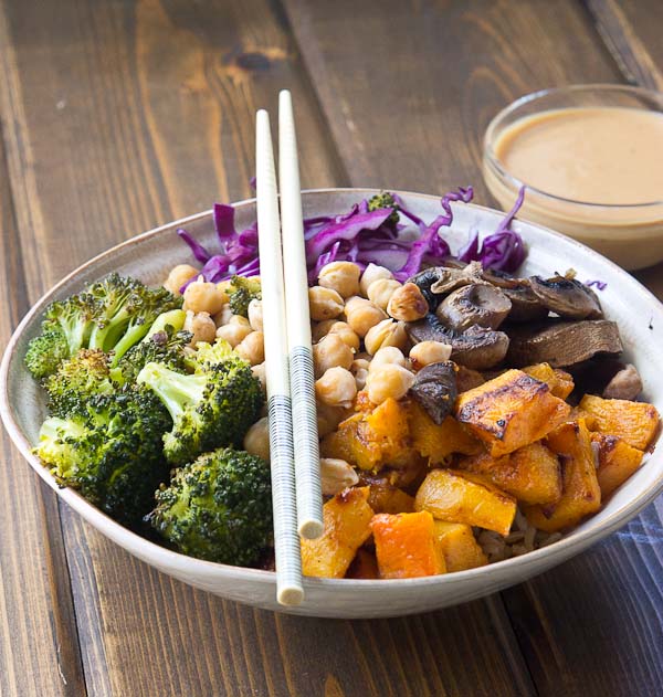 Abundance Bowls with Almond Butter-Lemon Dressing. Roasted veggies topped with the creamiest lemony almond butter dressing! This vegan abundance bowl will make you feel ahhhhhmazing from the inside out! 