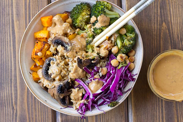 Abundance Bowls with Almond Butter-Lemon Dressing. Roasted veggies topped with the creamiest lemony almond butter dressing! This vegan abundance bowl will make you feel ahhhhhmazing from the inside out! 