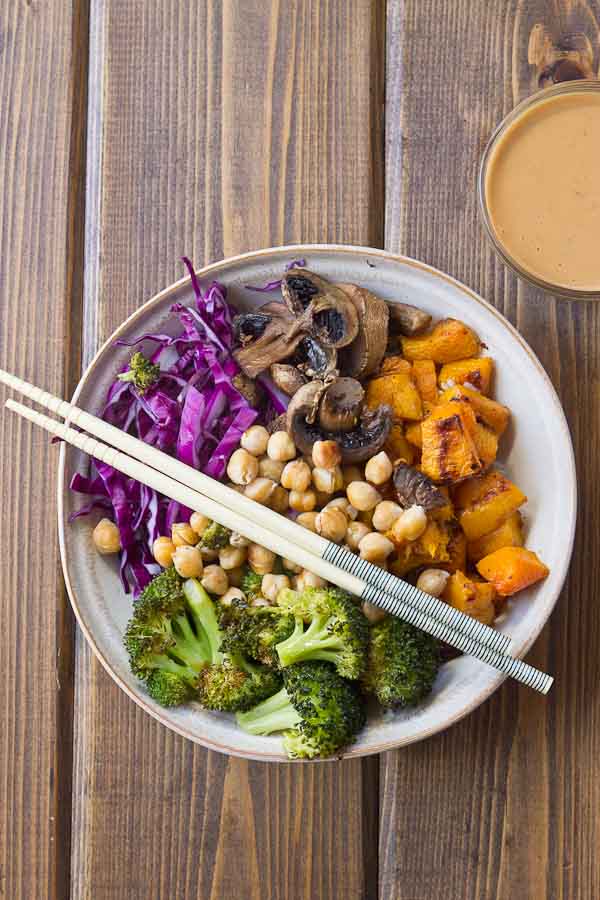 Abundance Bowls with Almond Butter-Lemon Dressing. Roasted veggies topped with the creamiest lemony almond butter dressing! This vegan abundance bowl will make you feel ahhhhhmazing from the inside out! 