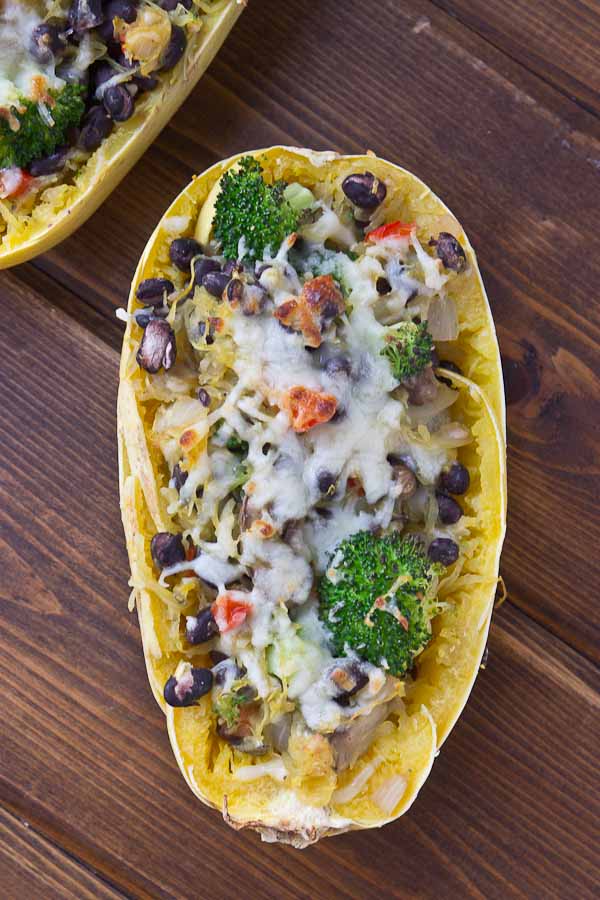 Vegetarian Spaghetti Squash Boats are the ultimate healthy comfort food made with whole simple ingredients, just right for a weeknight. You’ll be amazed at how simple they are to prepare. Bonus: these are meat and potatoes lovin' husband approved too, and that's sayin' somethin'. | @KristinaLaRueRD