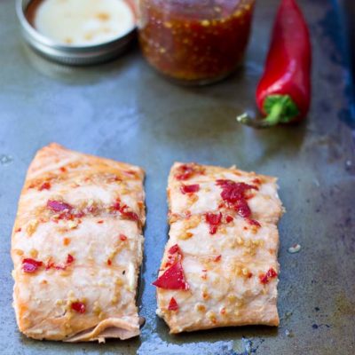 Sweet Chili Thai Salmon is a spiced up version of your traditional baked salmon. Sweet, hot and perfectly baked salmon out of the oven in 15 minutes flat.