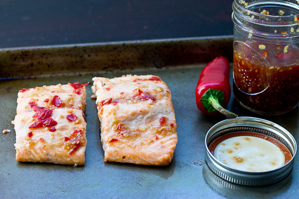 Sweet Chili Thai Salmon is a spiced up version of your traditional baked salmon. Sweet, hot and perfectly baked salmon out of the oven in 15 minutes flat. 