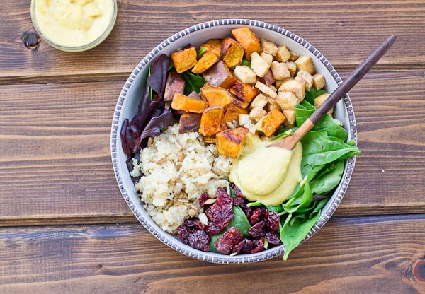 This Veggie Power Bowl topped with Cashew Honey Mustard Dressing is just what you need after a workout. It’s power-packed with quinoa, sweet potatoes, dried tart cherries, spring greens, roasted tofu, and sunflower seeds that will keep you fueled and speed recovery.