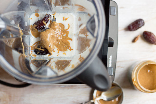 This Almond Butter Date Shake is just what you need to help you power through your day! It's creamy and dessert-like and makes a healthy protein rich snack or post workout recovery shake. | @KristinaLaRueRD