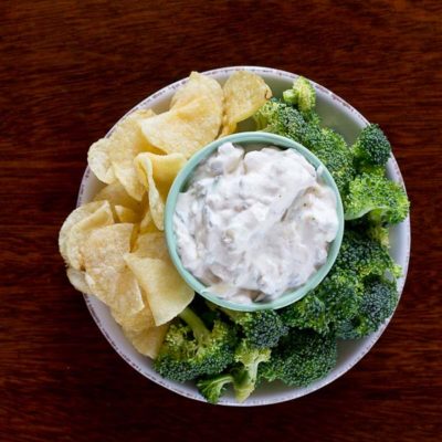 This Healthy French Onion Dip made with Greek yogurt and shredded zucchini makes a great party appetizer or snack. You're guests will never know it's healthy.