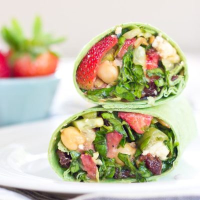 This Strawberry Salad Wrap is bursting with all the goodness of the Spring season. Sweet strawberries, crisp cucumbers and romaine lettuce tossed with a zesty balsamic vinaigrette and folded into a spinach wrap. Can't get enough.