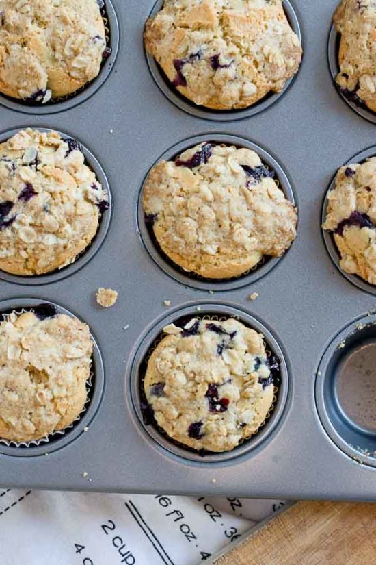 These Blueberry Cheesecake Muffins with Oatmeal Streusel Topping are protein-packed cottage cheese and made with fresh blueberries for a better-for-you gluten free blueberry muffin!