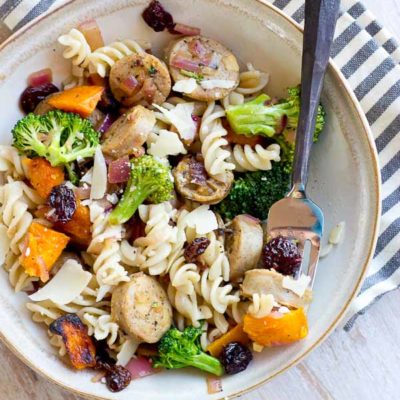 This Chicken Pasta with Butternut Squash, Caramelized Onions and Tart Cherries is perfect for fueling muscles post workout. The balance of protein, carbs, and anti-inflammatory foods in this recipe is one to keep on hand after a tough sweat session or to fuel up for a race day. | @KristinaLaRueRD