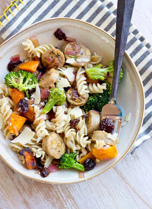 This Chicken Pasta with Butternut Squash, Caramelized Onions and Tart Cherries is perfect for fueling muscles post workout. The balance of protein, carbs, and anti-inflammatory foods in this recipe is one to keep on hand after a tough sweat session or to fuel up for a race day. | @KristinaLaRueRD