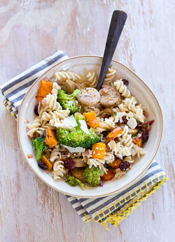 This Chicken Pasta with Butternut Squash, Caramelized Onions and Tart Cherries is perfect for fueling muscles post workout. The balance of protein, carbs, and anti-inflammatory foods in this recipe is one to keep on hand after a tough sweat session or to fuel up for a race day. | @KristinaLaRueRD