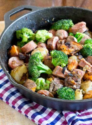 Start your day off with a hearty breakfast and enjoy this Chicken & Veggie Breakfast Skillet made with mushrooms, onions, broccoli, potatoes, and chicken sausage. Veggie packed and husband approved.