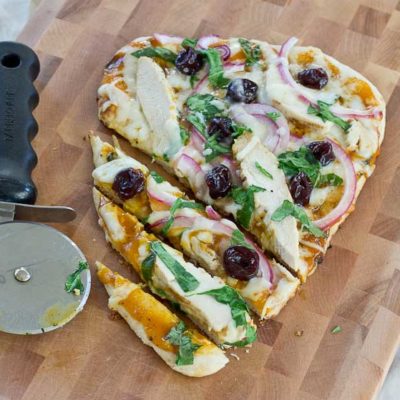 Fire up the grill for this BBQ Chicken Naan Pizza with Tart Cherries—it’s perfect for a summer gathering and comes together in just minutes!