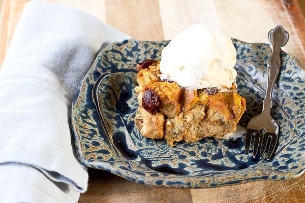 This Pumpkin Bread Pudding with Tart Cherries will warm up your home and fall spirit. Serve a warmed slice a la mode with a scoop of vanilla ice cream for extra decadence. You can thank me later. | @KristinaLaRueRD | loveandzest.com