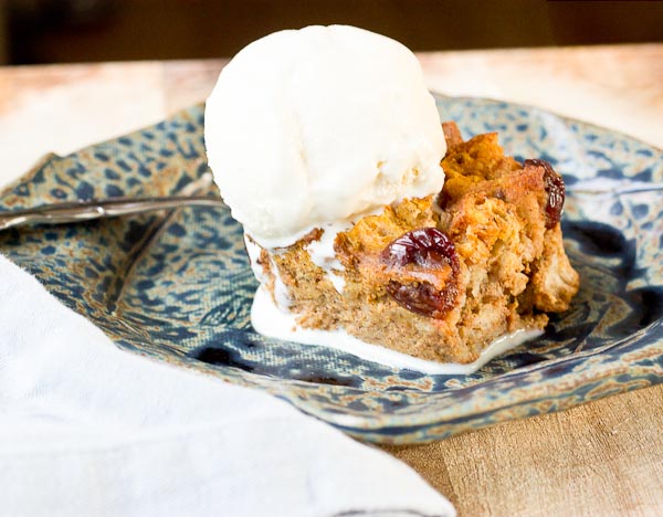 This Pumpkin Bread Pudding with Tart Cherries will warm up your home and fall spirit. Serve a warmed slice a la mode with a scoop of vanilla ice cream for extra decadence. You can thank me later. | @KristinaLaRueRD | loveandzest.com