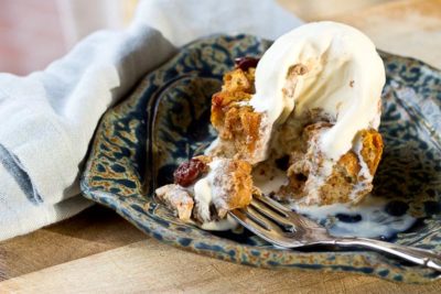 This Pumpkin Bread Pudding with Tart Cherries will warm up your home and fall spirit. Serve a warmed slice a la mode with a scoop of vanilla ice cream for extra decadence. You can thank me later. | @KristinaLaRueRD | loveandzest.com