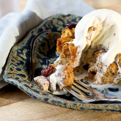 This Pumpkin Bread Pudding with Tart Cherries will warm up your home and fall spirit. Serve a warmed slice a la mode with a scoop of vanilla ice cream for extra decadence. You can thank me later. | @KristinaLaRueRD | loveandzest.com