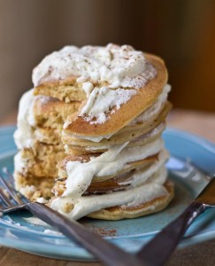 Impress your family and house guests with a stack of festive Eggnog Pancakes topped with creamy Eggnog Whipped Cream. | @KristinaLaRueRD | loveandzest.com