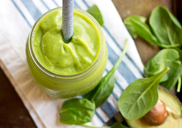 Overhead shot of creamy avocado green smoothie 