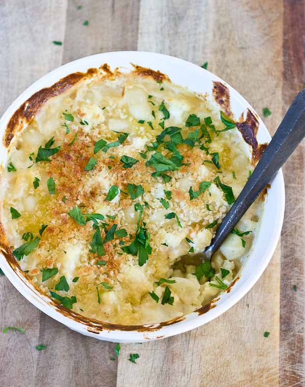 This Cauliflower "Mac" n Cheese, made with gnocchi instead of macaroni is so creamy and so cheesy, it's hard to resist eating it all up! Have a bowl of this "Mac n Cheese" and eat your veggies too!