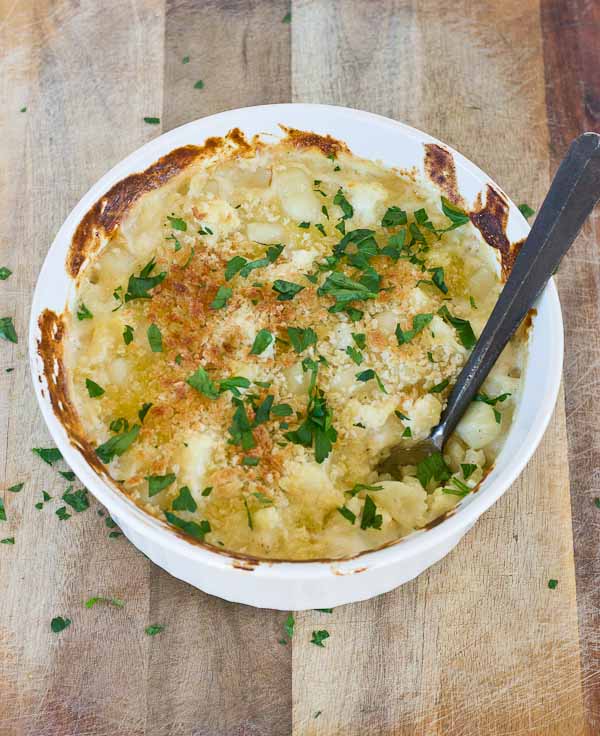 This Cauliflower "Mac" n Cheese, made with gnocchi instead of macaroni is so creamy and so cheesy, it's hard to resist eating it all up! Have a bowl of this "Mac n Cheese" and eat your veggies too!