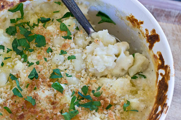 This Cauliflower "Mac" n Cheese, made with gnocchi instead of macaroni is so creamy and so cheesy, it's hard to resist eating it all up! Have a bowl of this "Mac n Cheese" and eat your veggies too!