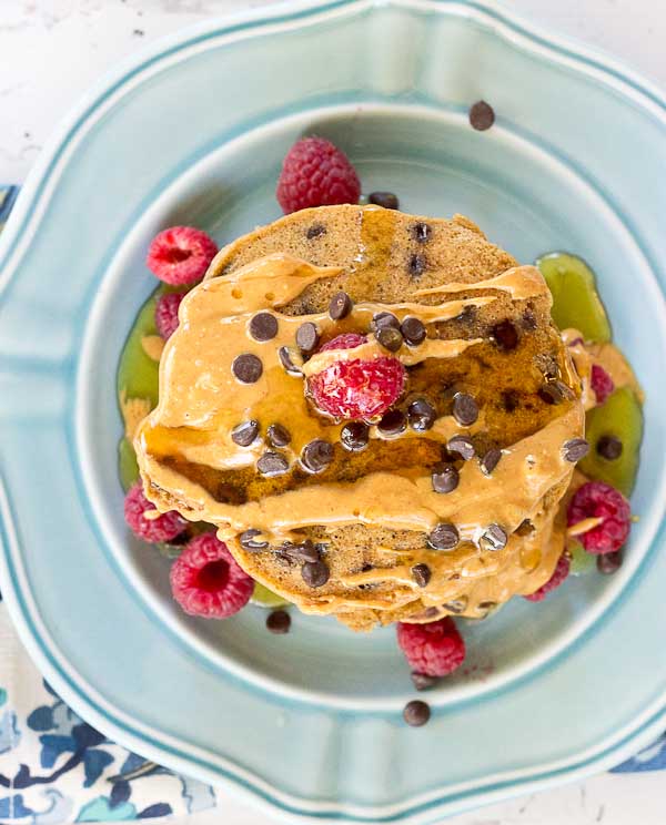 Holy yummy in my tummy... Chocolate Chip Peanut Butter Pancakes for the win! Peanut butter flour and mini chocolate chips in a fluffy pancake = breakfast made in heaven.