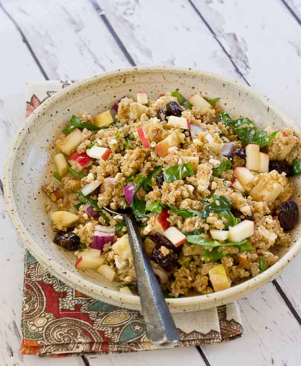 Make a batch of this Cinnamon Apple Quinoa Salad to eat during the week for a quick and healthy lunch. This grain salad made with quinoa, apples, tart cherries, spinach and feta makes you feel super healthy with every bite. Serve on a bed of lettuce for an even bigger nutrition boost.
