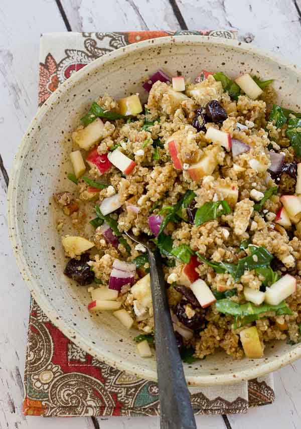 Make a batch of this Cinnamon Apple Quinoa Salad to eat during the week for a quick and healthy lunch. This grain salad made with quinoa, apples, tart cherries, spinach and feta makes you feel super healthy with every bite. Serve on a bed of lettuce for an even bigger nutrition boost.