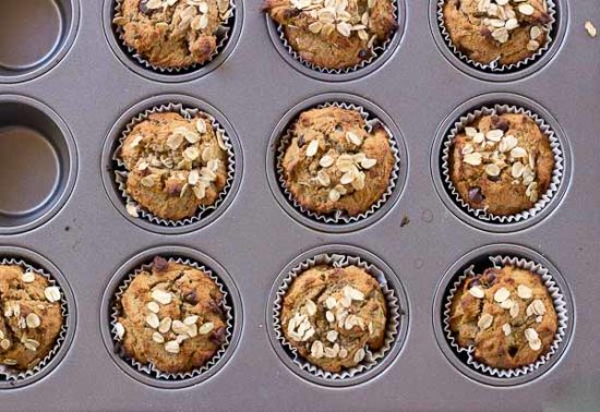 These Almond Butter Banana Oat Muffins are moist, satisfying, and have an delicious almond butter banana flavor. There is just enough chocolate in every bite to satisfy a sweet tooth. Flourless and gluten free. 