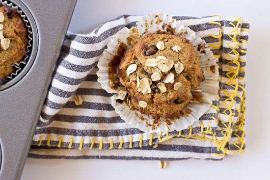 These Almond Butter Banana Oat Muffins are moist, satisfying, and have an delicious almond butter banana flavor. There is just enough chocolate in every bite to satisfy a sweet tooth. Flourless and gluten free. 