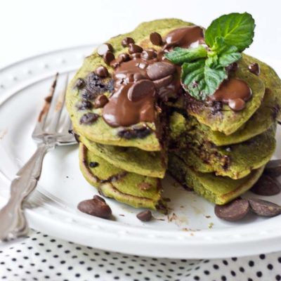 Start your morning with these Mint Chocolate Chip Blender Pancakes! These taste like Mint Chocolate Chip ice cream but in pancake form. Get your green pancake on just in time for St Patty's Day! Whole wheat, dye and coloring free, dark chocolate, and a hidden source of veggies for breakfast.