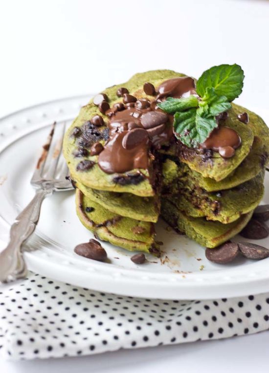 Start your morning with these Mint Chocolate Chip Blender Pancakes! These taste like Mint Chocolate Chip ice cream but in pancake form. Get your green pancake on just in time for St Patty's Day! Whole wheat, dye and coloring free, dark chocolate, and a hidden source of veggies for breakfast. 