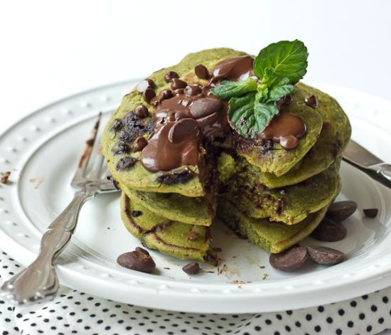 Start your morning with these Mint Chocolate Chip Blender Pancakes! These taste like Mint Chocolate Chip ice cream but in pancake form. Get your green pancake on just in time for St Patty's Day! Whole wheat, dye and coloring free, dark chocolate, and a hidden source of veggies for breakfast. 