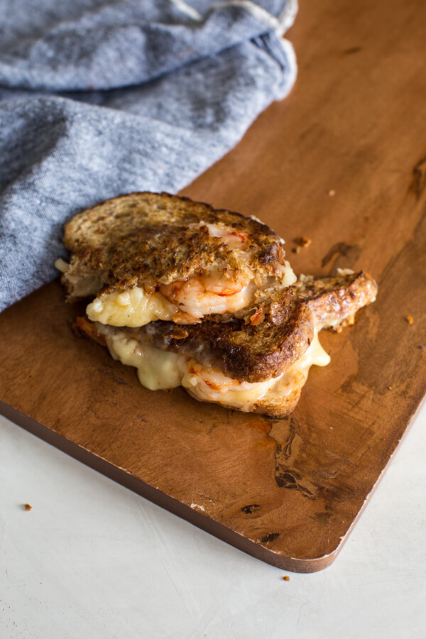 This Shrimp Grilled Cheese doesn't hold anything back-- melted cheddar cheese, buttered toast, and large grilled shrimp. Let loose, unwind and savor this comfort food any night of the week. 