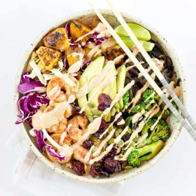 This Tropical Buddha Bowl is infused with island flavor from the Coconut Brown Rice to the Almond Butter Lime dressing. Perfectly grilled shrimp, pineapple, tart cherries, and a bowl full of veggies! It’s great for meal prep.