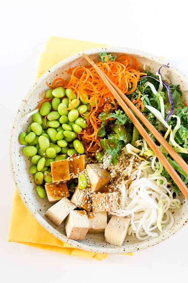 I'm all about this Asian Rice Noodle Bowl. 1. because the favor is da bomb dot com and totally unique for us and 2. it's ready in like 5 minutes flat thanks to some great Trader Joe's finds.