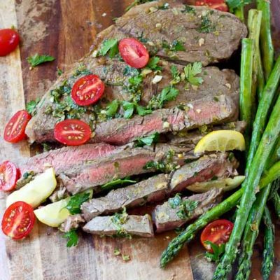 Grilled Top Sirloin Filets with Italian Salsa Verde.... this protein is all about the flavor. The bursts of lemon garlic in this sauce on top of grilled top sirloin is outrageously good and enhances the flavor of the beef.