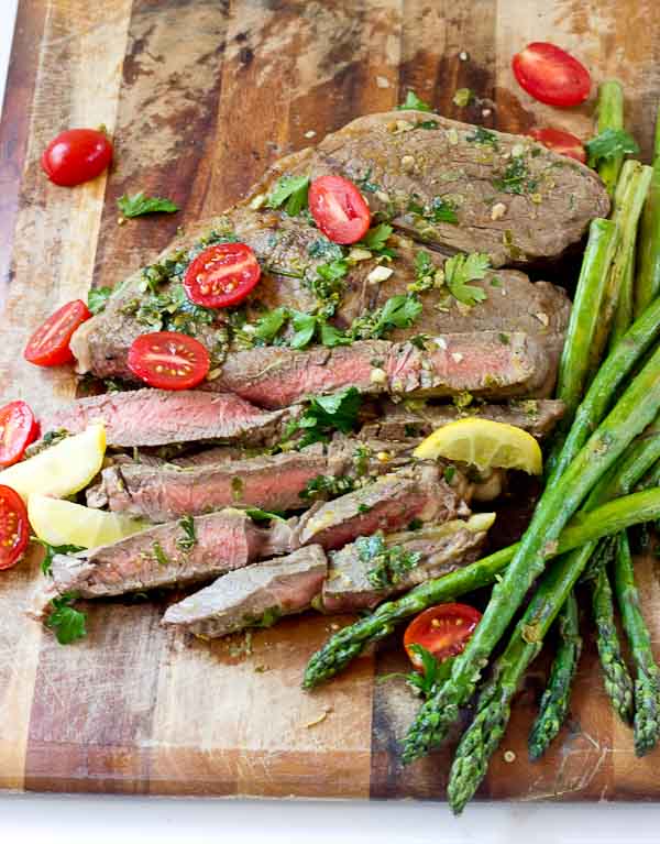 Grilled Top Sirloin Filets with Italian Salsa Verde.... this protein is all about the flavor. The bursts of lemon garlic in this sauce on top of grilled top sirloin is outrageously good and enhances the flavor of the beef.