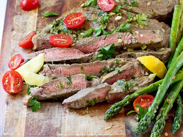 Grilled Top Sirloin Filets with Italian Salsa Verde.... this protein is all about the flavor. The bursts of lemon garlic in this sauce on top of grilled top sirloin is outrageously good and enhances the flavor of the beef.