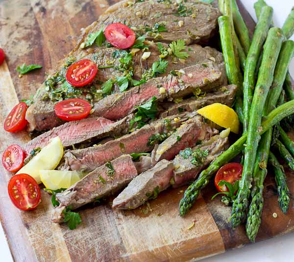 Grilled Top Sirloin Filets with Italian Salsa Verde.... this protein is all about the flavor. The bursts of lemon garlic in this sauce on top of grilled top sirloin is outrageously good and enhances the flavor of the beef.